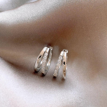 pure titanium steel, hypoallergenic double-loop stud earrings.