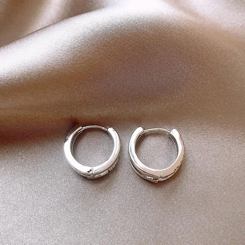 pure titanium steel, hypoallergenic double-loop stud earrings.