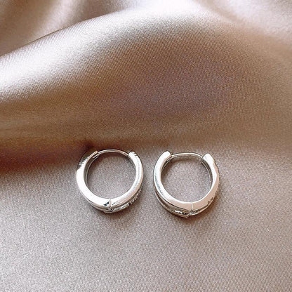pure titanium steel, hypoallergenic double-loop stud earrings.